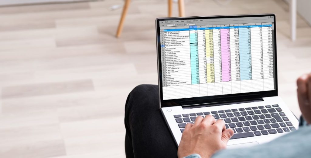 a laptop screen showing a spreadsheet